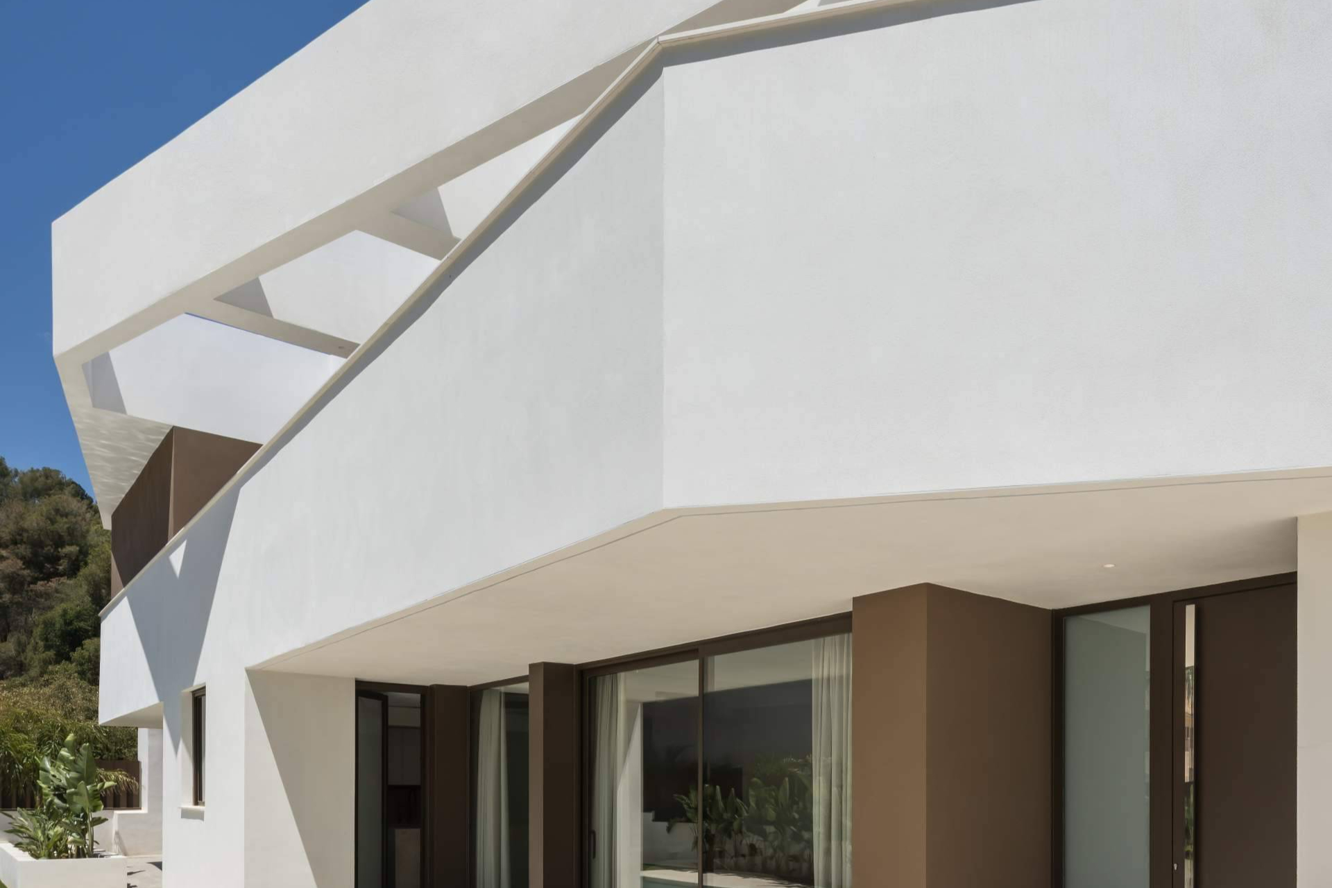 Casa Nexo, transformar la limitación en arquitectura; el caso de una parcela imposible